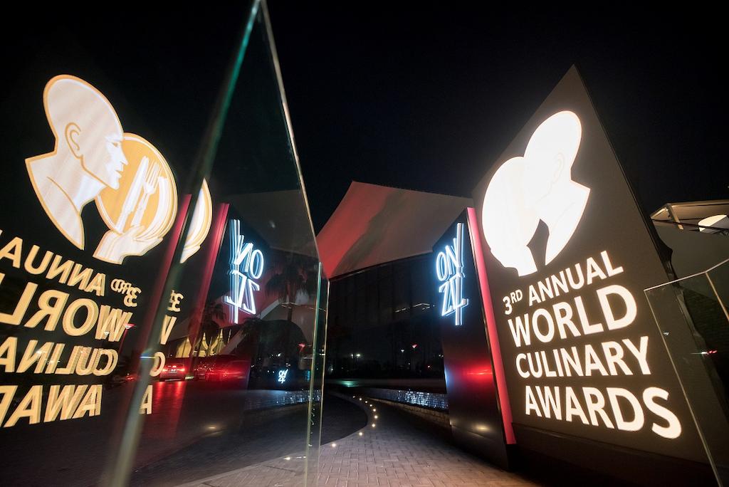 poster of 3rd annual world culinary awards|poster Greece best restaurants 2022|front view by nigt of botrinis restaurant IN Athens|plate with special food from botrinis restaurant|room at alios ilios restarant|plate with special food from alios ilios restaurant